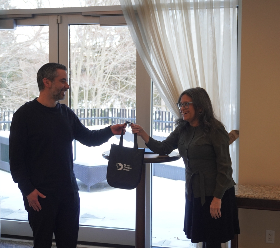 a man presenting a woman with a gift