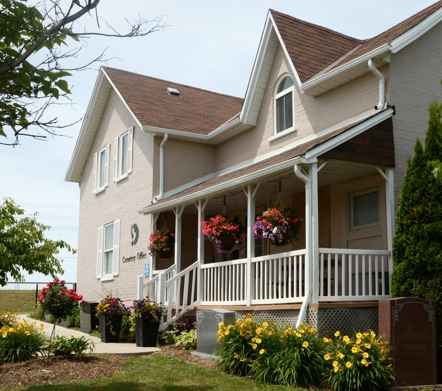 house with porch and flowers