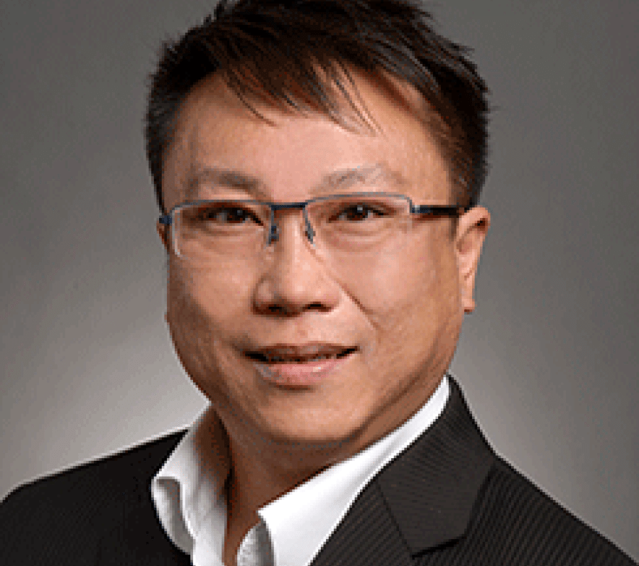 smiling asian man with glasses