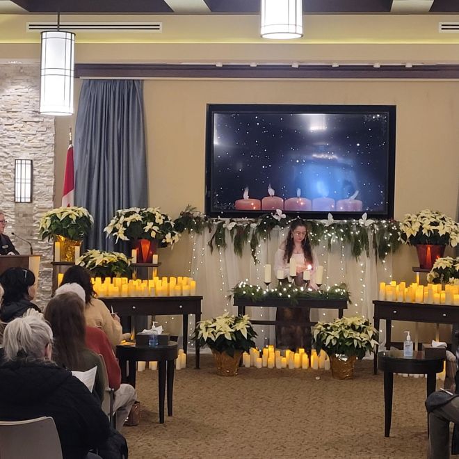 candles and flowers with screen