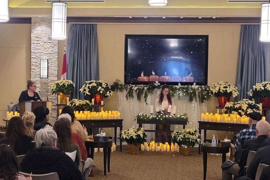 candles and flowers with screen
