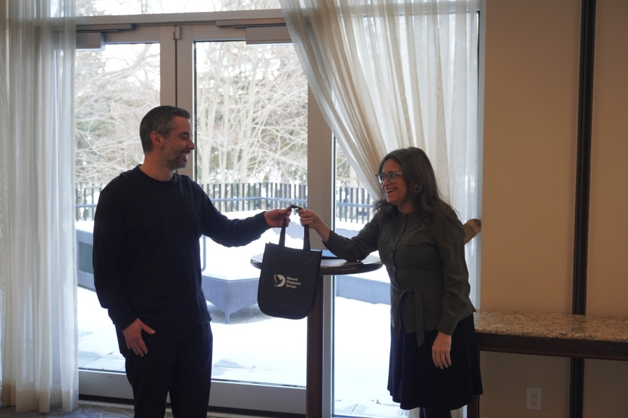 a man presenting a woman with a gift