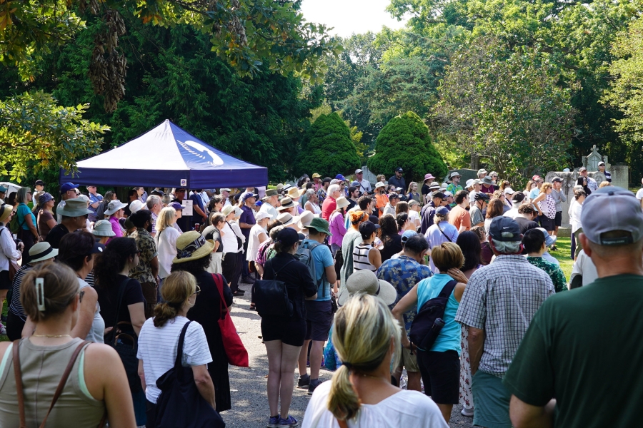 Crowd attending a history tour at Mount Pleasant Cemetery.