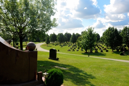 Peaceful view of Thornton Cemetery, Cremation and Funeral Centre, highlighting its tranquil grounds, mature trees, and historic memorials.