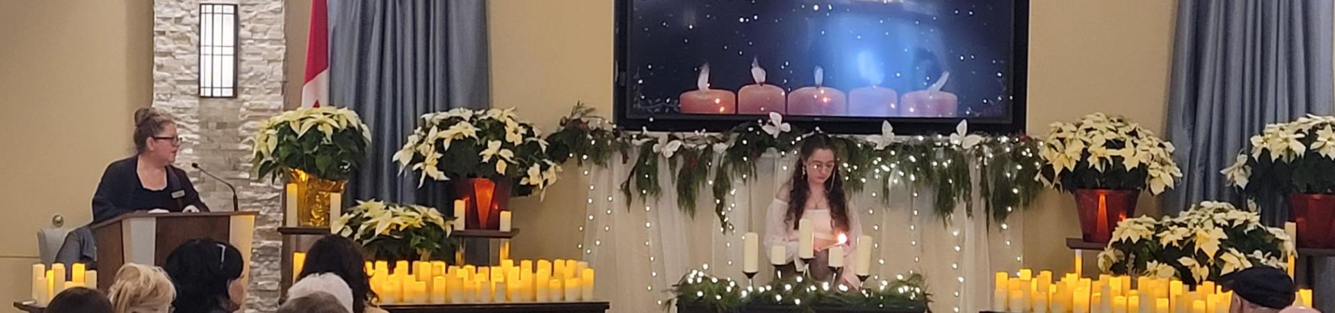 candles and flowers with screen